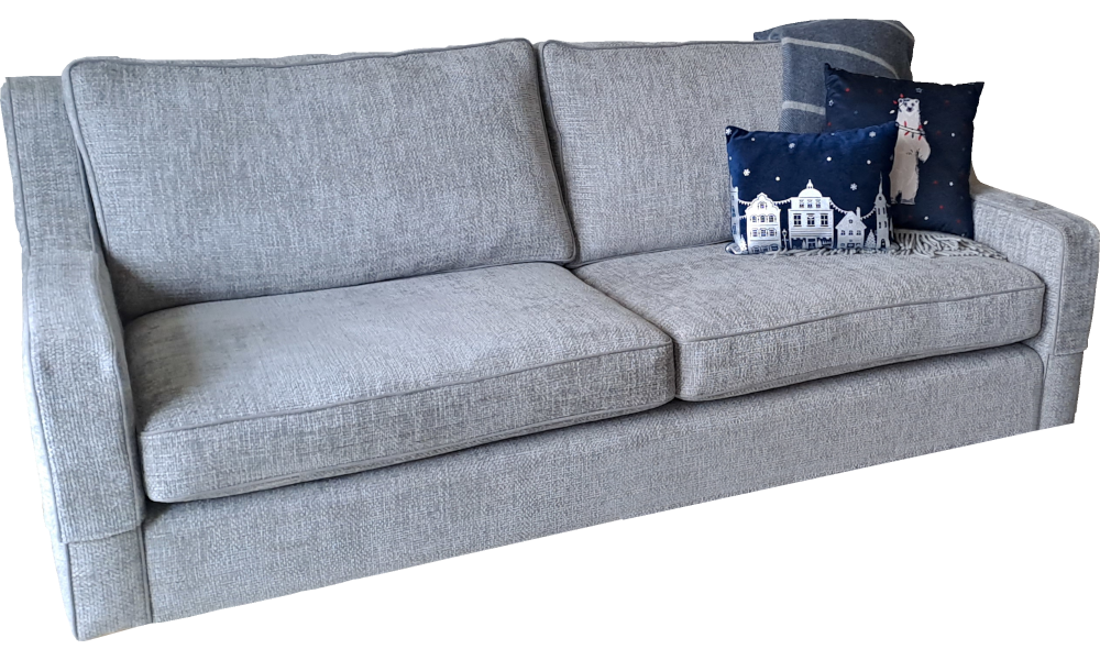 The same sofa with more cushions.